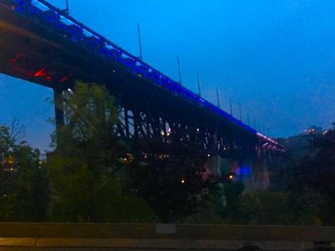 The High Level Bridge in Edmonton, Alberta illuminated blue and white for dystonia.